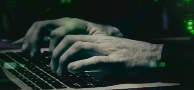 Person typing on the computer.